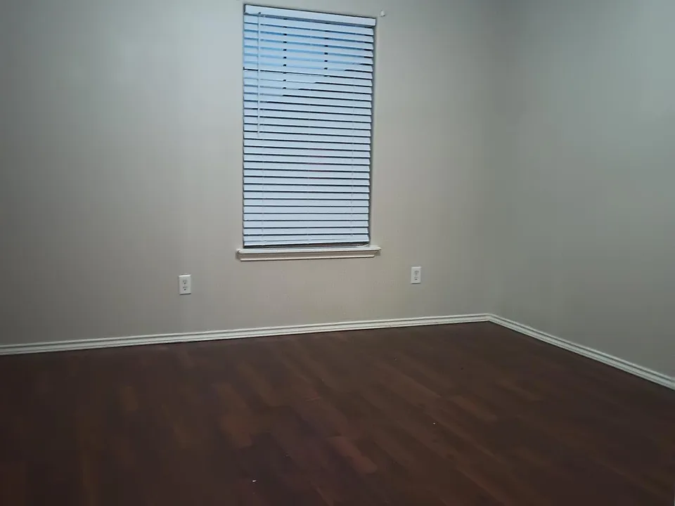 Faux Mahogany flooring in Master Bedroom