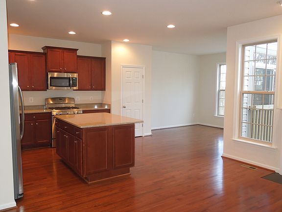 Island kitchen with stainless steel appliances