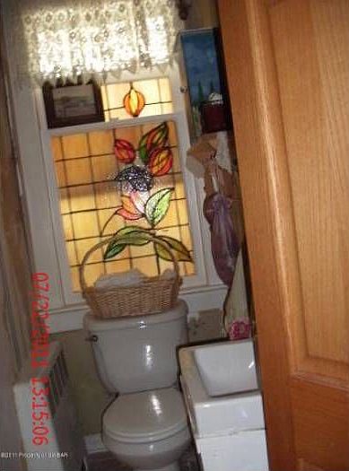 bathroom with stained gla