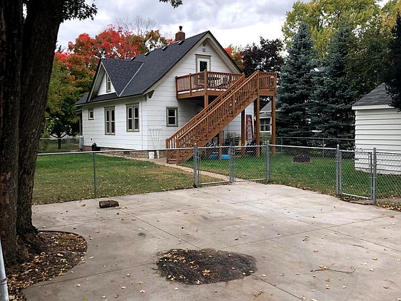 Backyard with detached garage and 2 off street parking spots. Fenced in yard.