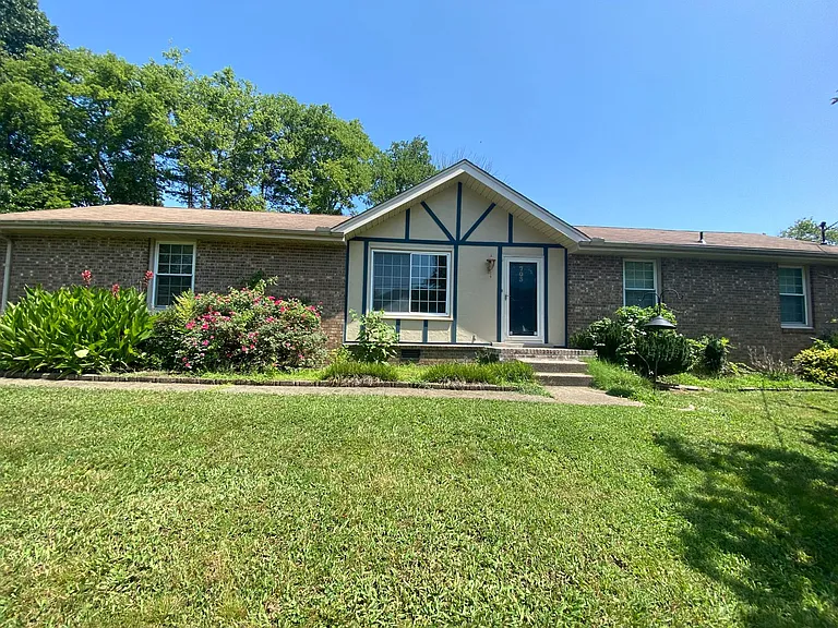 703 Lucien Rd — Photo 1