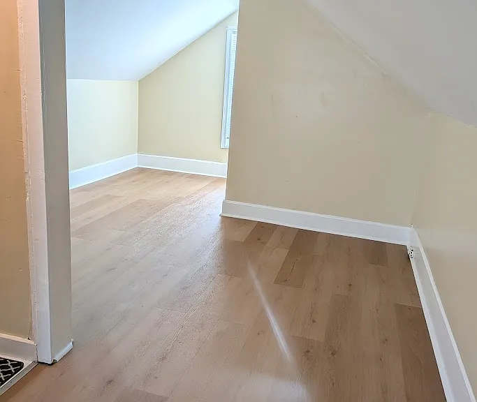 upstairs...closet behind that wall.