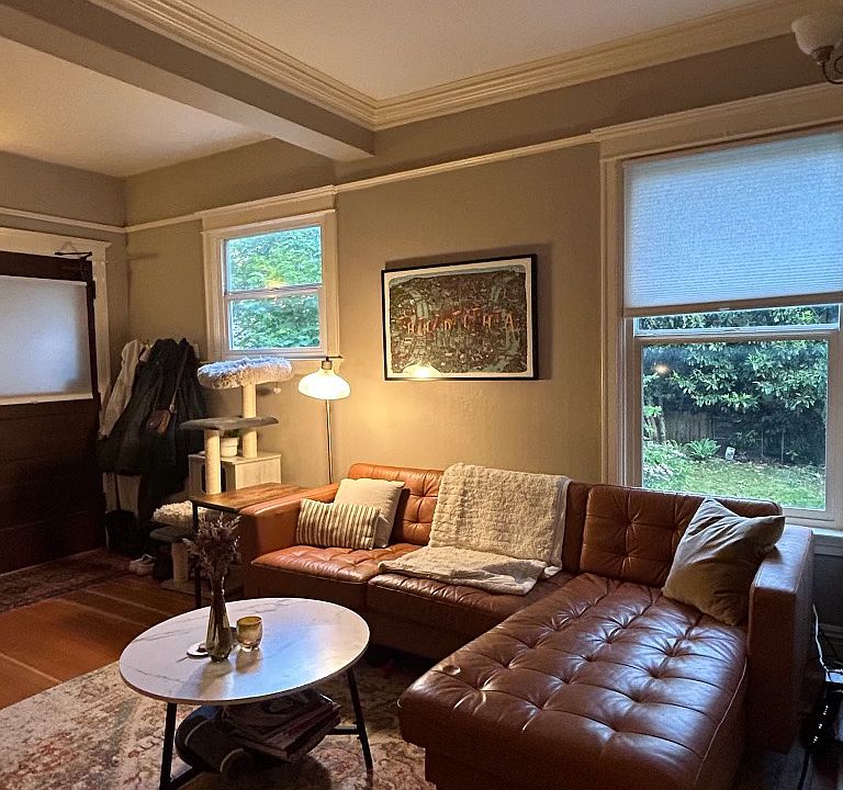 Living room with South facing windows onto garden space
