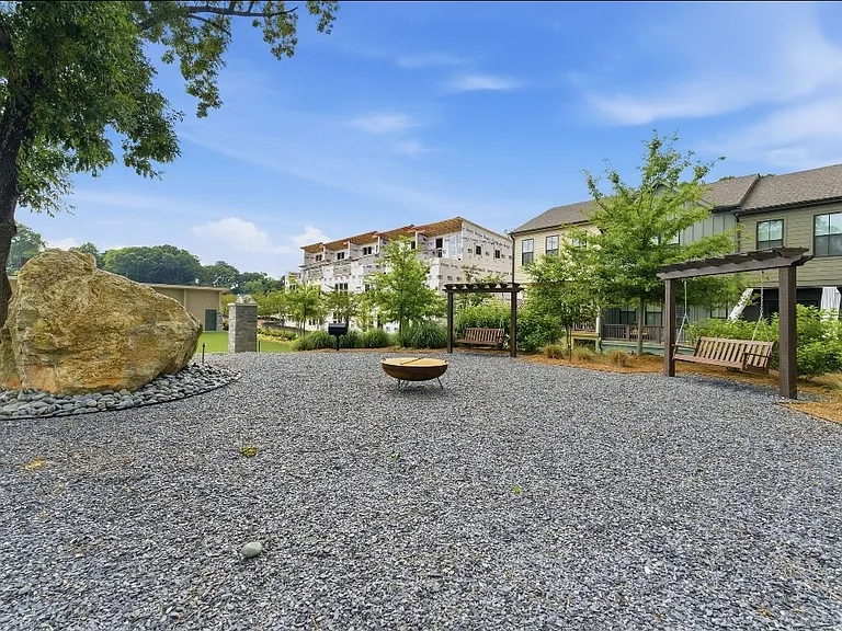 Community common area with firepits and swing seating