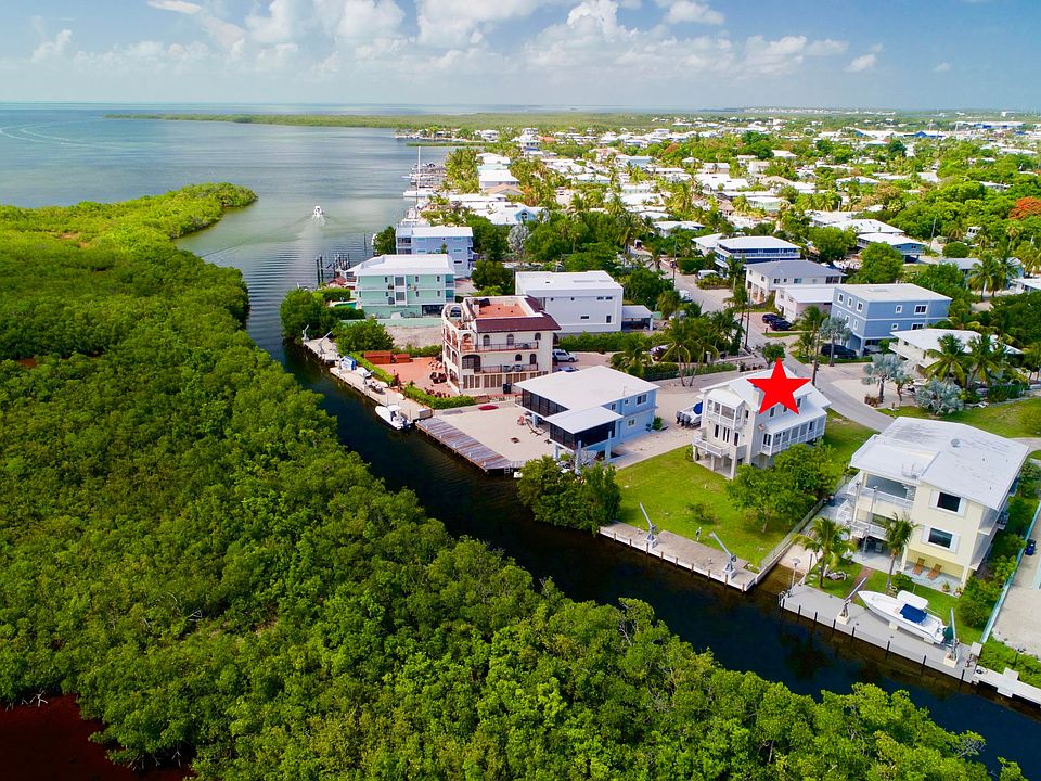 1st image of 348 S Coconut Palm Blvd