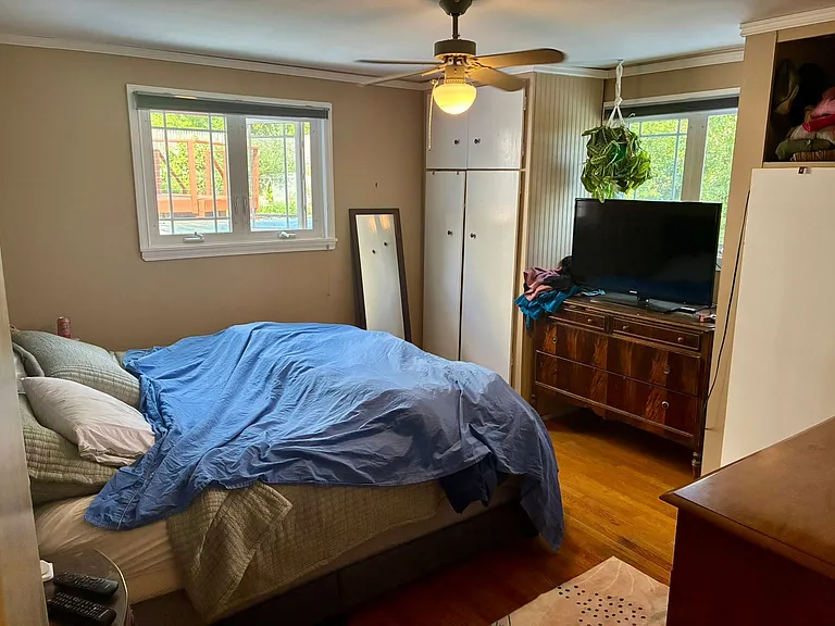 Upper level bedroom 1; medium sized with built in closets