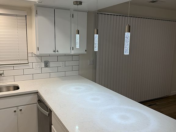 Kitchen island with modern pendant lights