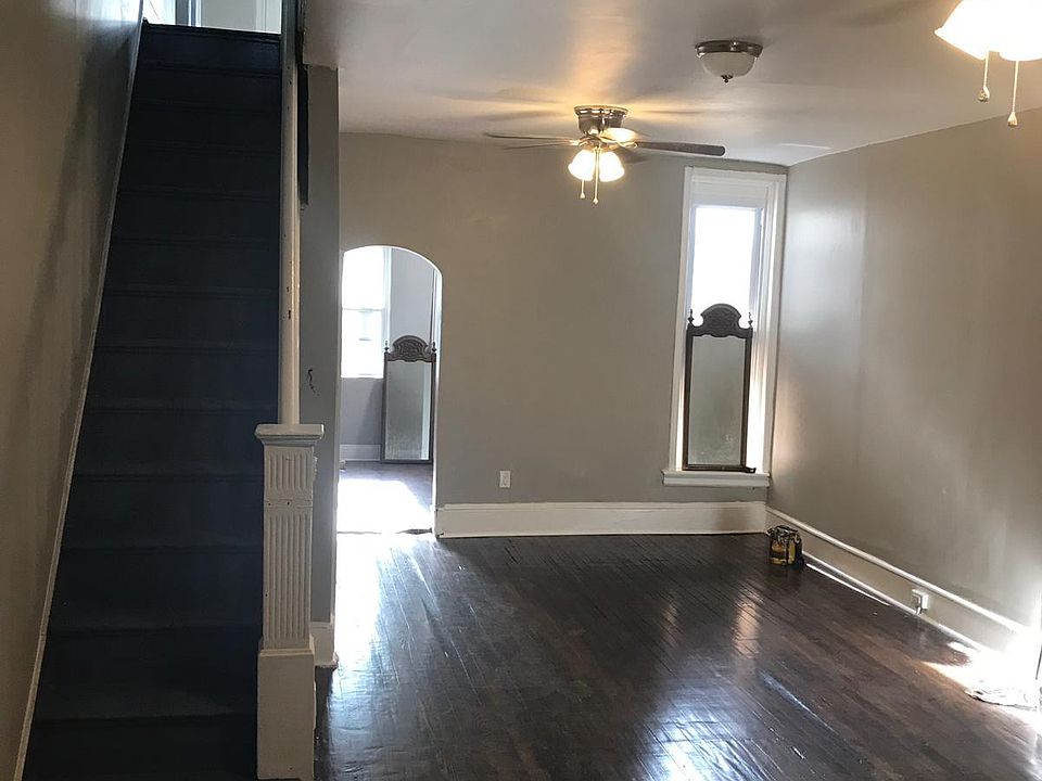 Living Room, With 2 Fans and Plenty of Lighting!