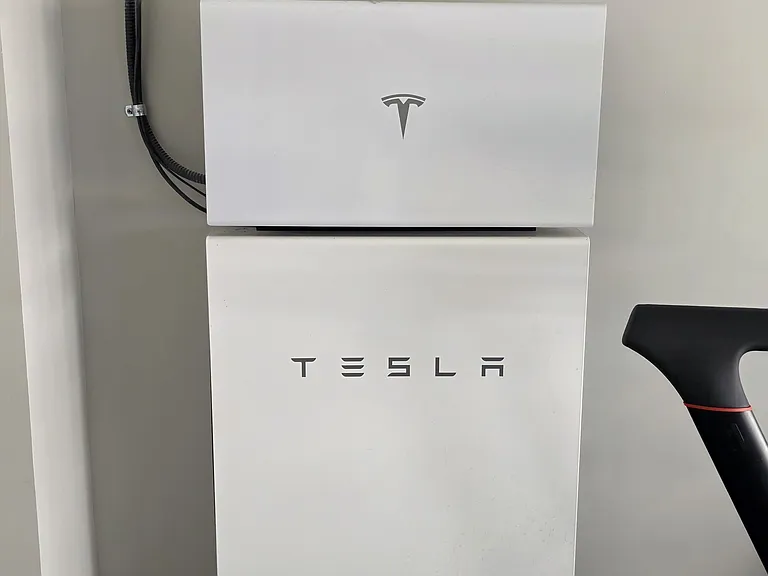 Tesla Back-up Battery (Powers the home during blackout/overnight and stores solar power)