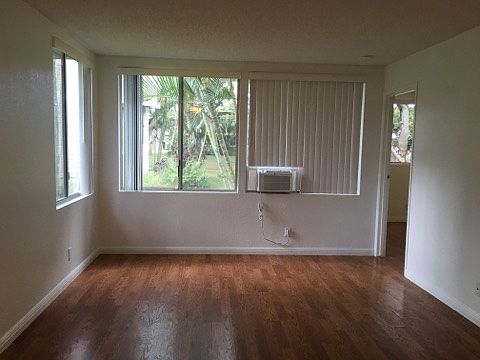 Living area adjacent to dining area.