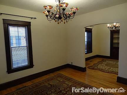 Living Room 2
						:
						Matching Tiffany chandeliers add elegance and warmth.
