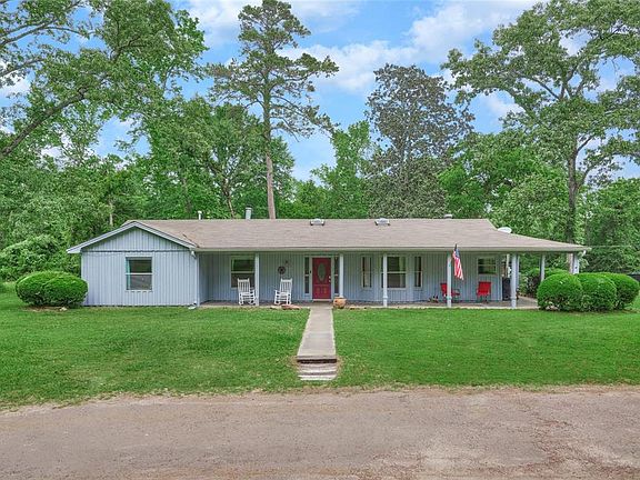 Once you drive up the circle drive you are greeted by a welcoming walkway and wrap around porch.