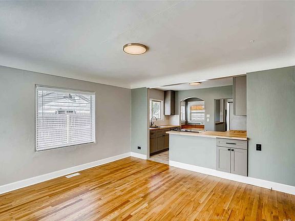 View from inside the front door. Open concept living room and kitchen