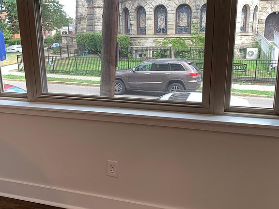 Front view looking out new windows of apartment