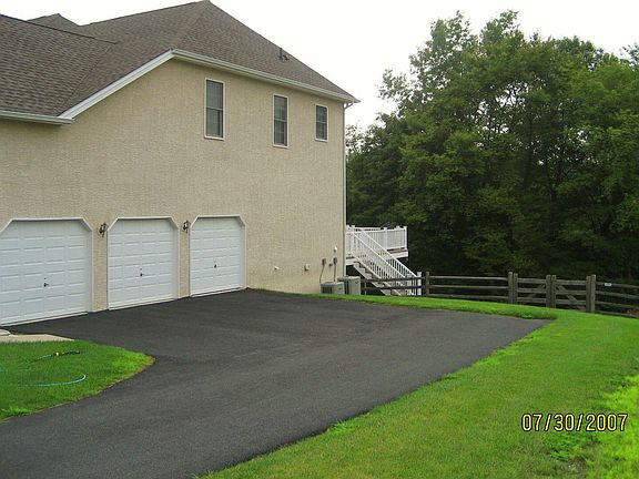 Private Driveway with 3-Car Garage