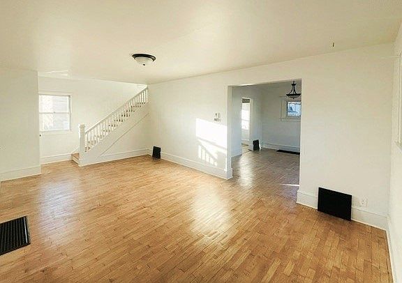 Well-lit, spacious living room for friends and family to gather.