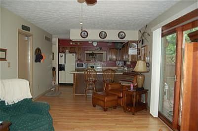 Open floor family room and kitchen layout. Garage entrance & walk out to deck