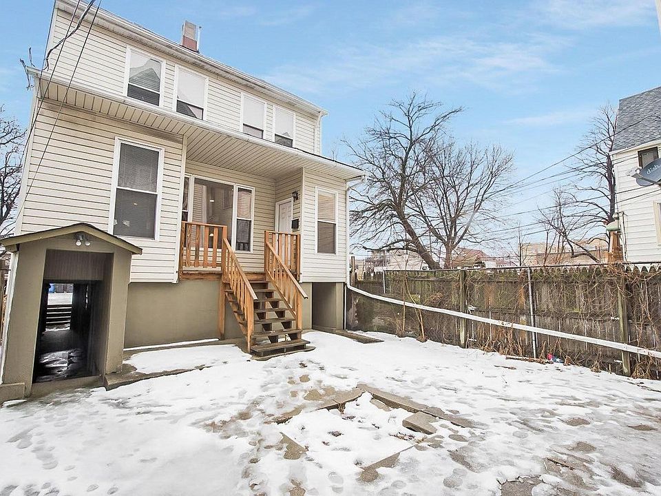 Front porch with walkway to rear side of house