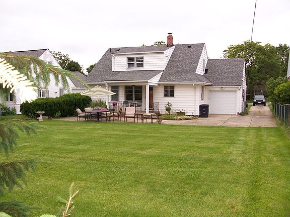 Large back yard with garden areas