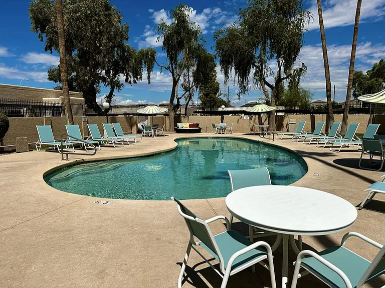 Enjoy the COMMUNITY POOL and HOT TUB with JETS, along with new pool furniture and tables for your comfort and relaxation!