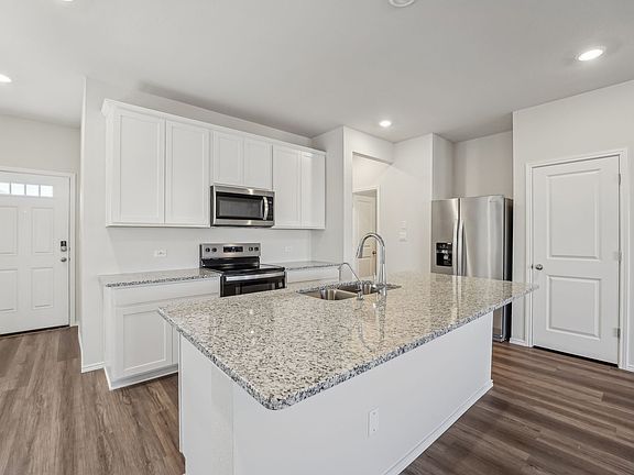 Cook a delicious meal in this beautiful kitchen.