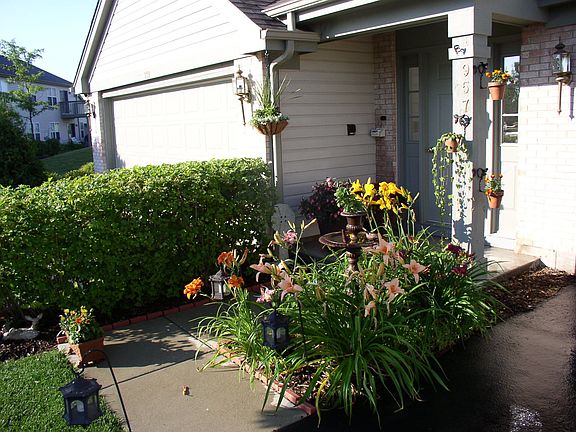 Front entrance, neighbor's garage