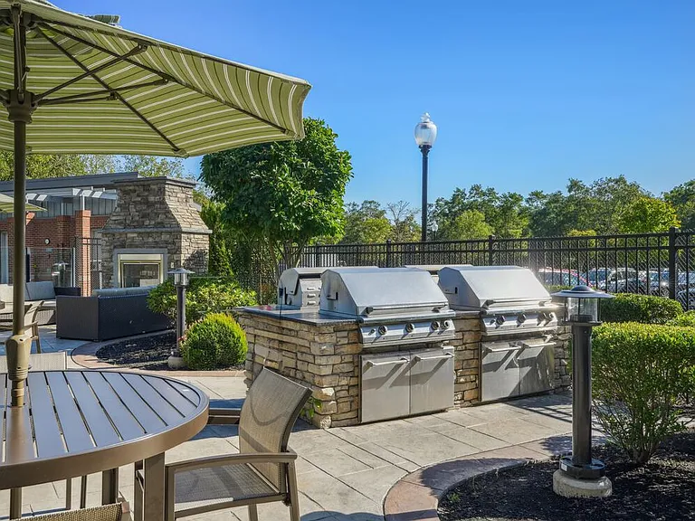 Courtyard with BBQ grills and picnic areas