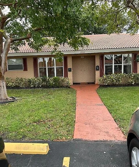 7950 NW 37th Dr #E — Photo 1