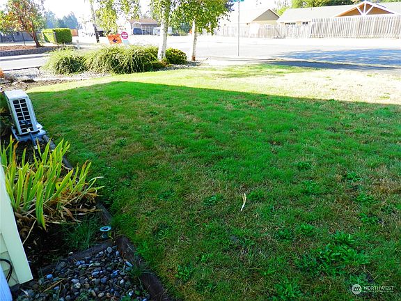 West side yard, note mini split outside unit>
