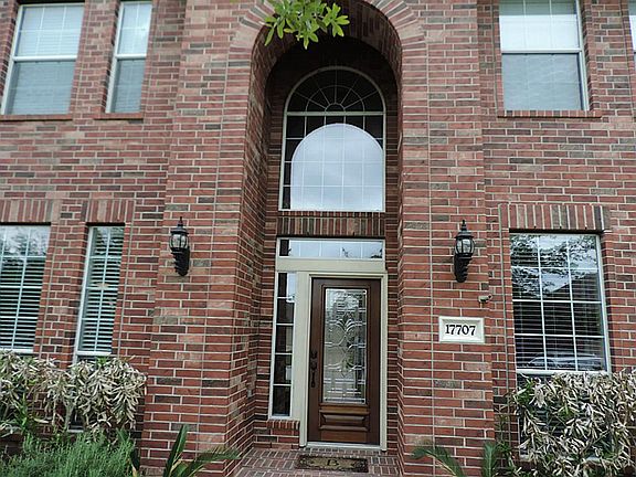 Bricked Entry with Solid Wood Mahogany door w/leaded Glass