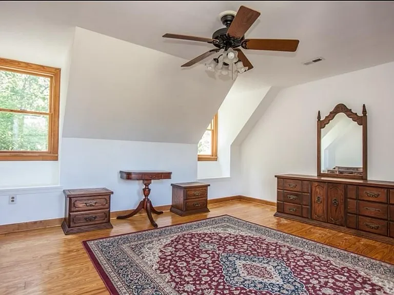 Left Upstairs Bedroom with private bathroom with shower and tub