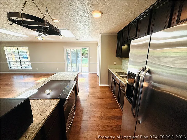 6927 Wickersham Dr — Photo 3