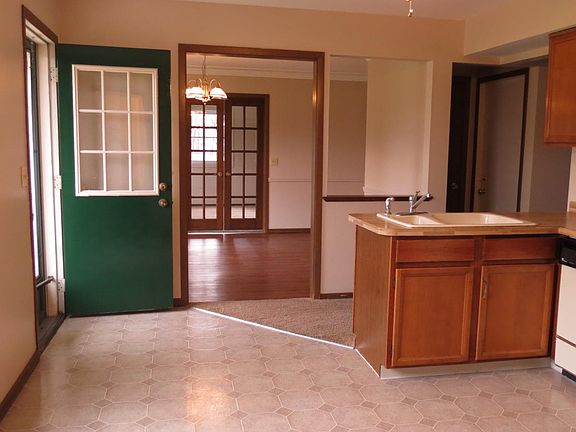 View from kitchen to back rooms