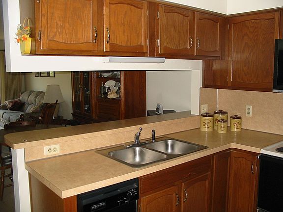 Kitchen with view to Dining Area and Living Room