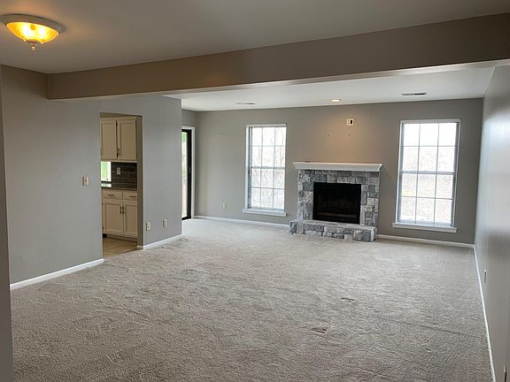 Living room with gas lit fireplace
