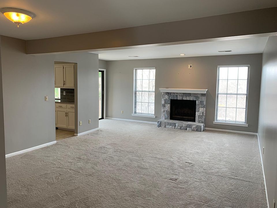 Living room with gas lit fireplace