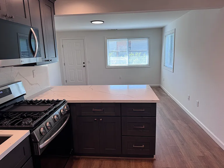 view form kitchen towards living room and front door