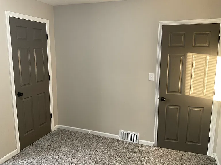 Bedroom 1 entry door and closet door