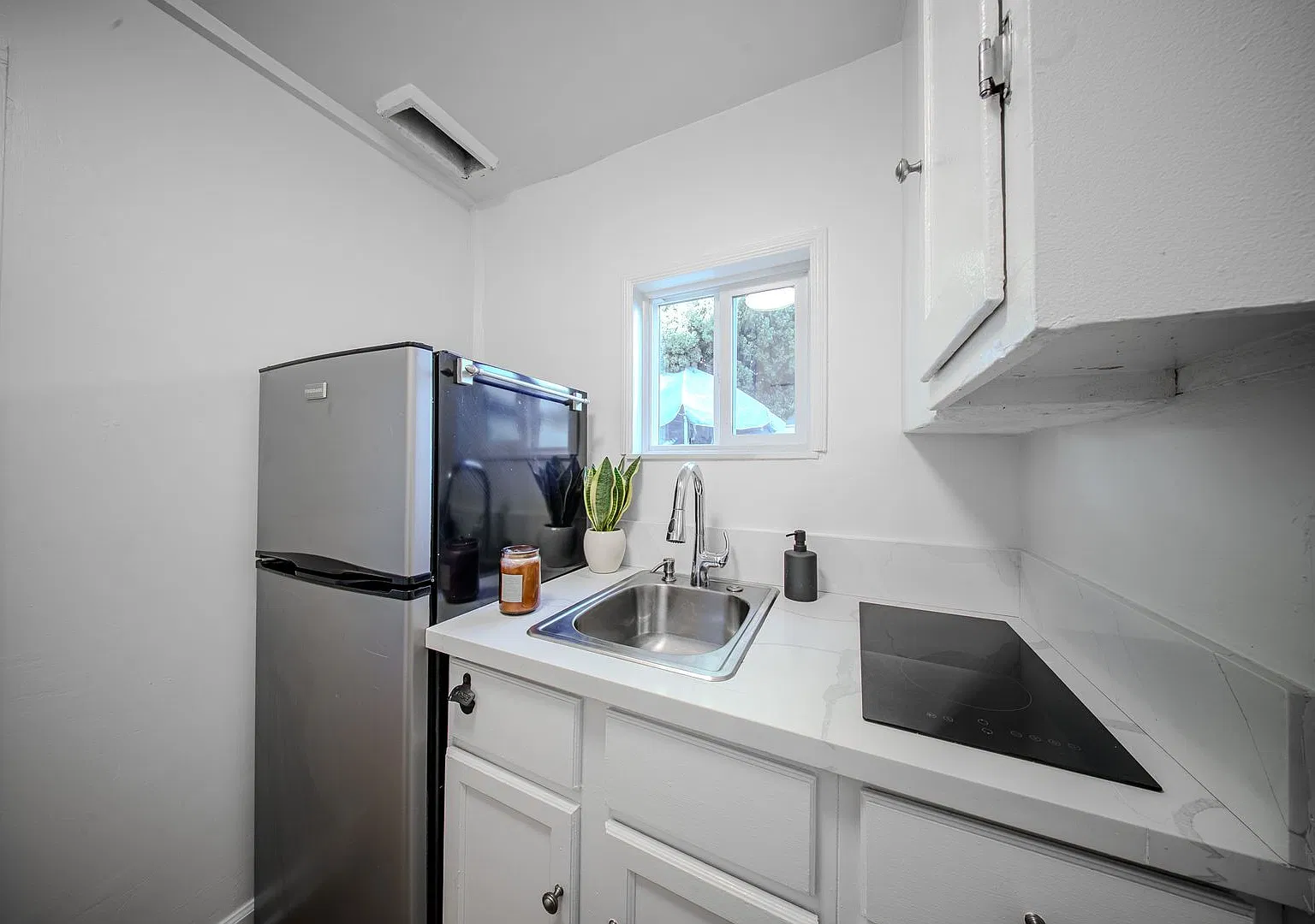 1090 Freeman Ave & 3114-3118 E 11th St — Photo 4