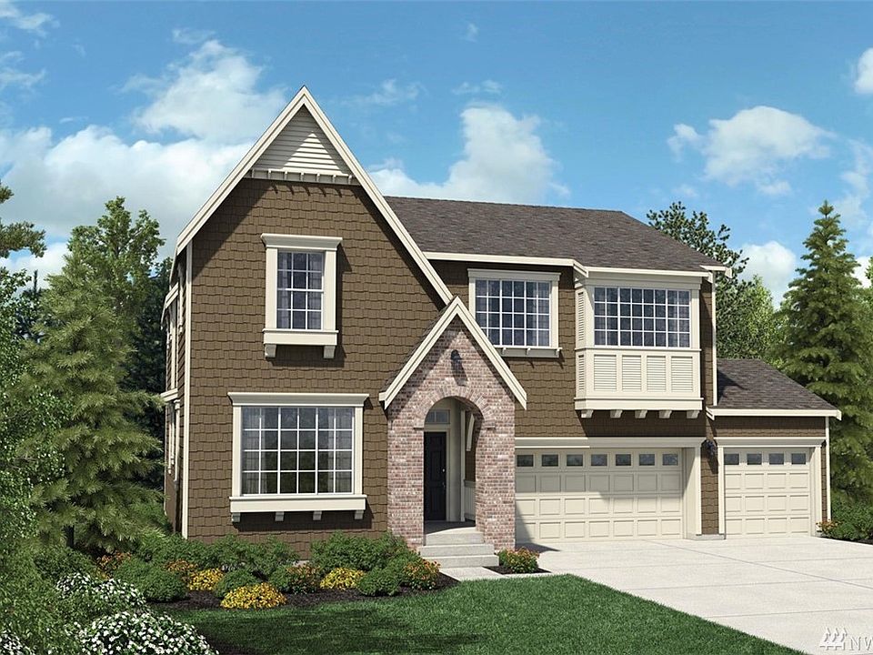 The GEORGIA features a flowing design, w/extensive main floor hardwoods, gourmet kitchen w/Kitchen Aid appliances, quartz countertops, lrg walk-in pantry, adjoining dining & great rms. Main floor bed w/full bath. Double door entry to inviting master suite, spa like bath, w/walk-in closet. Upstairs loft, large rec.room plus additional bed and bath in bsmt. Spacious deck for entertaining!