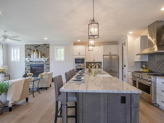 Floor plans and photos shown may include base features along with additional options and upgrades.