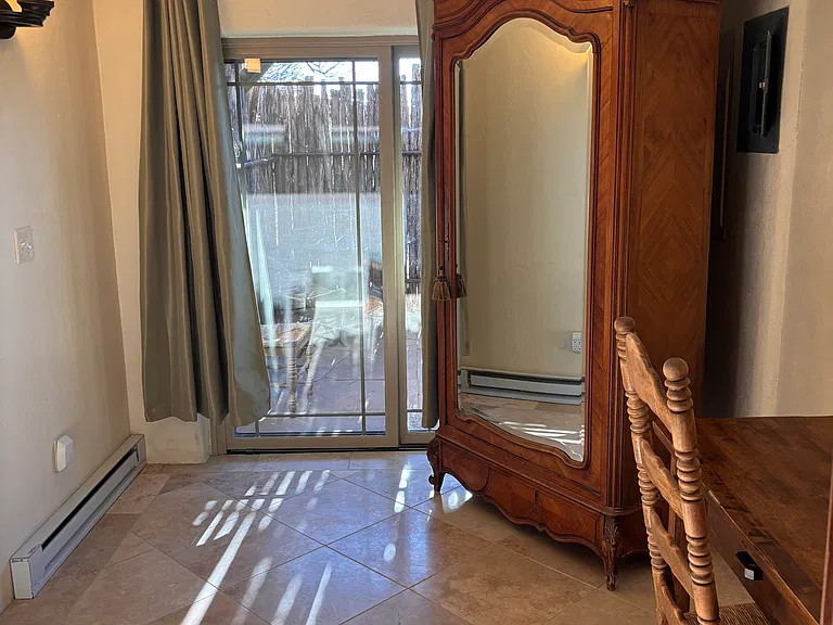 Perfect office with glass doors to a private patio.