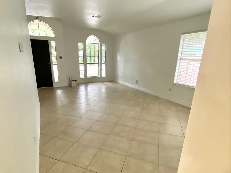 Formal living room with natural light - view from different angle.