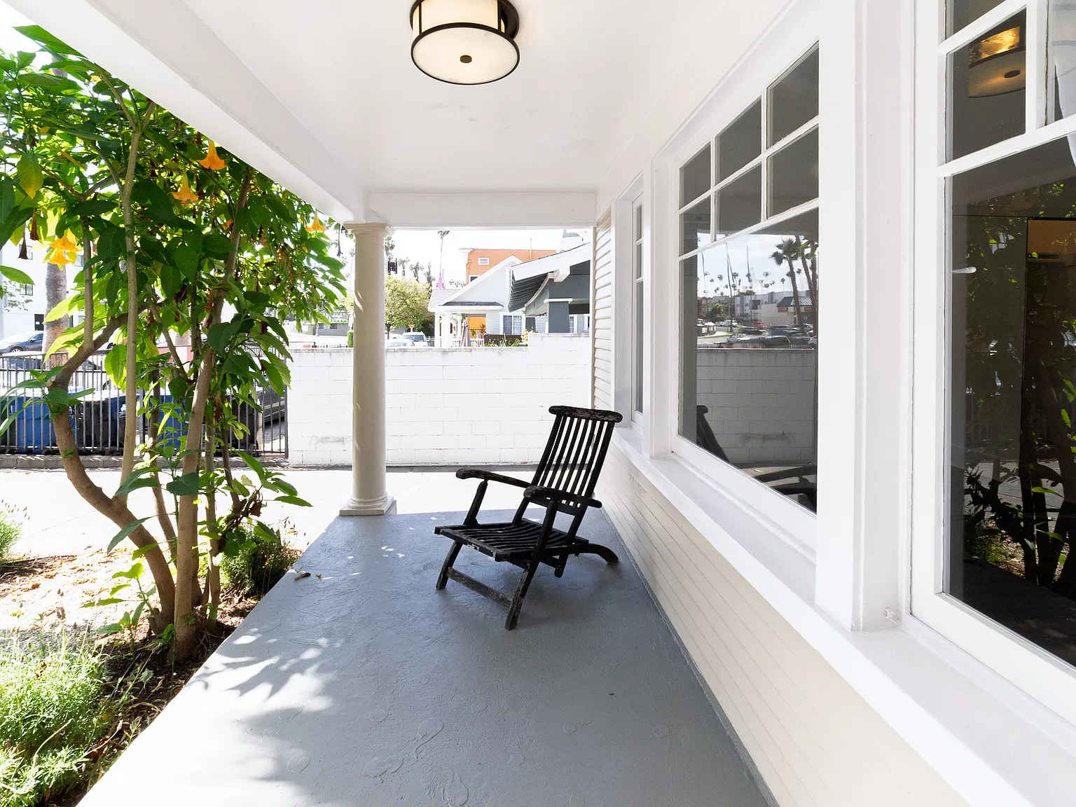 Updated 2 Br/2 Bath Craftsman w/ Gated Parking, Private Patio + Charm — Photo 2