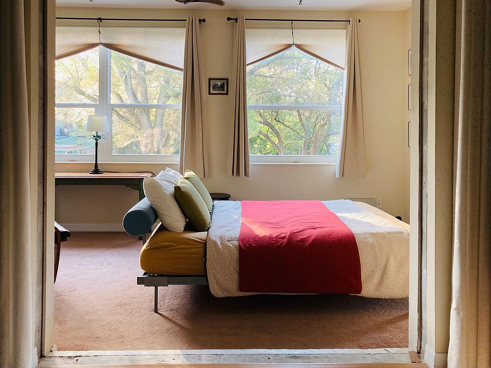 The queen bed in the back room is 6" latex and hypoallergenic.