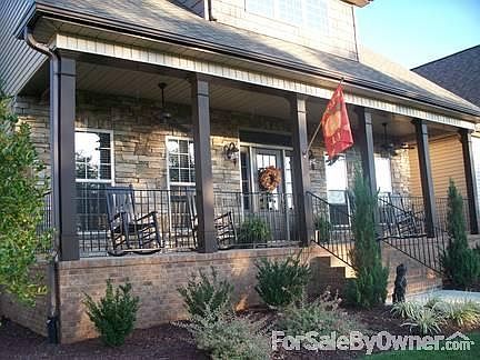 Open Living Room w/ Rock Fireplace