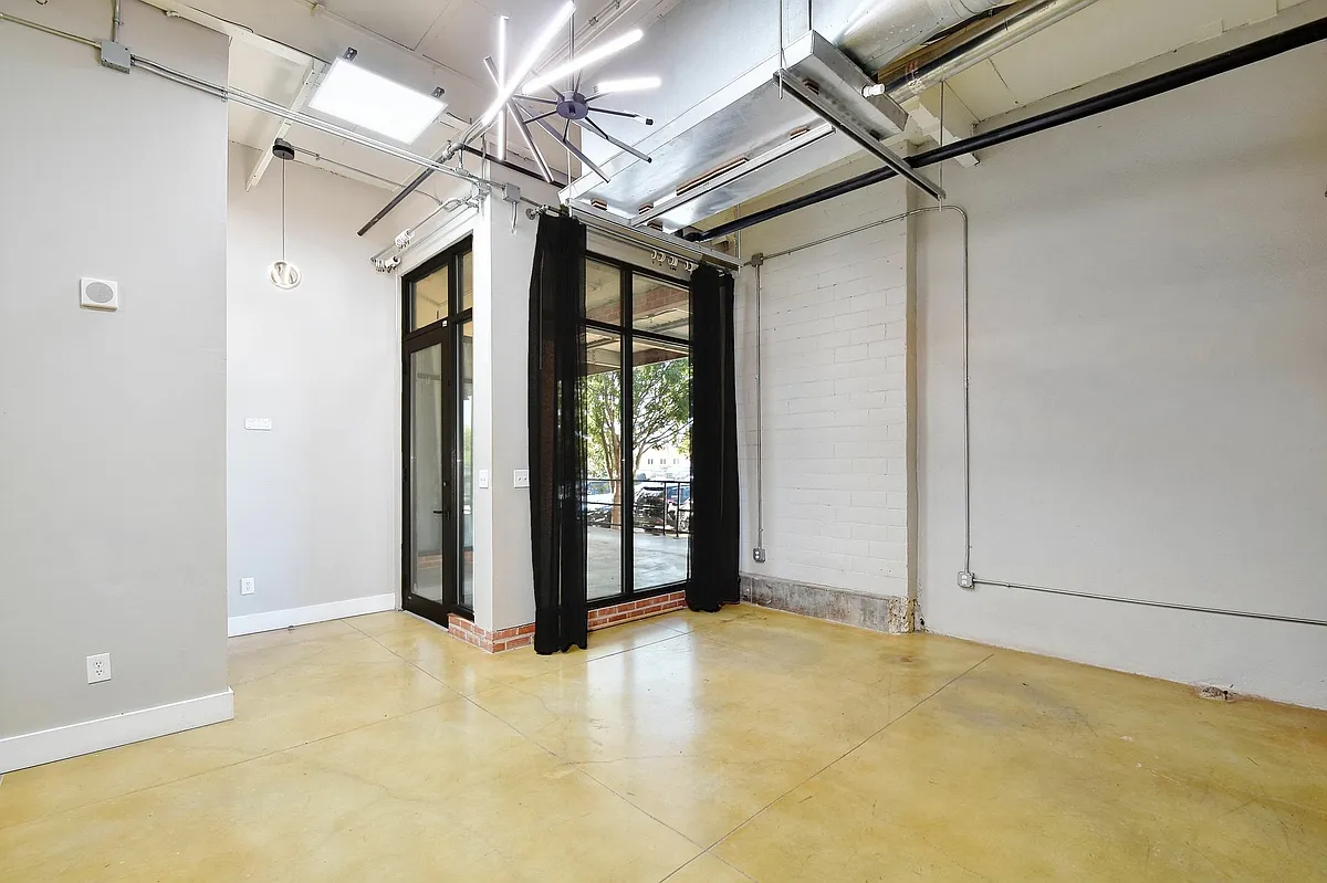 Building Photo - 3363 E Commerce St #144