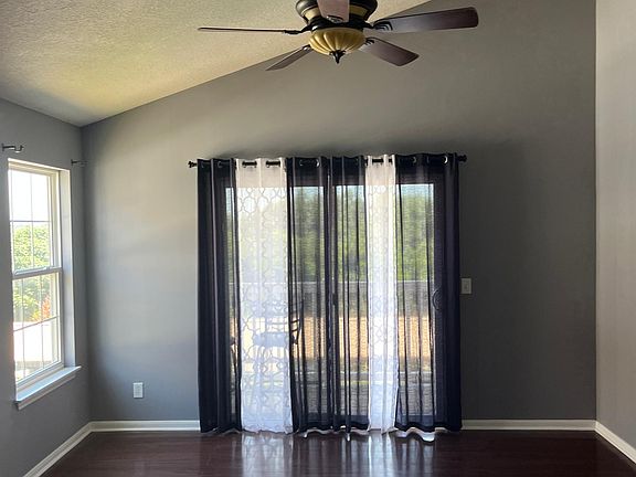 Spacious living area that walks out to a deck with a great view. Luxury vinyl flooring