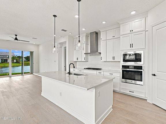 4th image of 13011 WHISPERING WINDS Drive