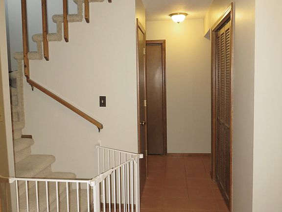 Entry off kitchen and living